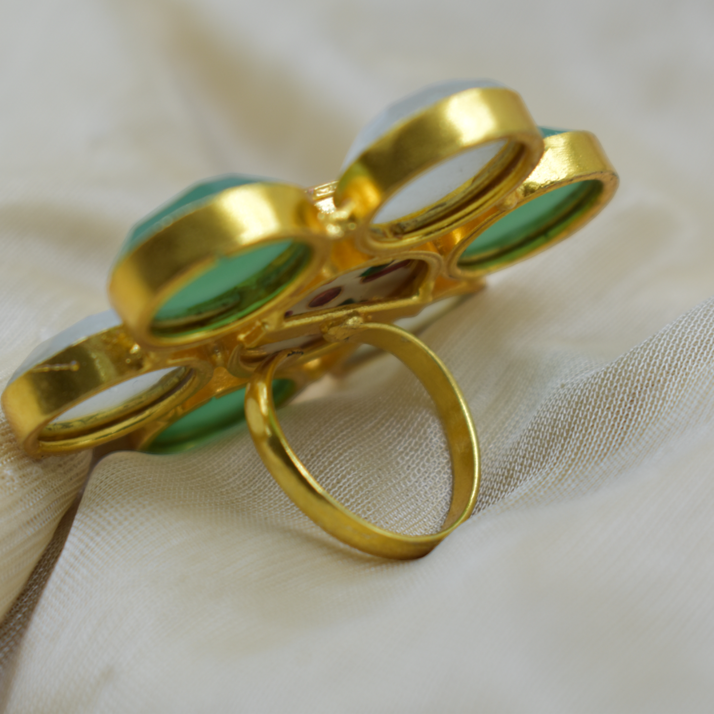 A goldplated brass stone ring