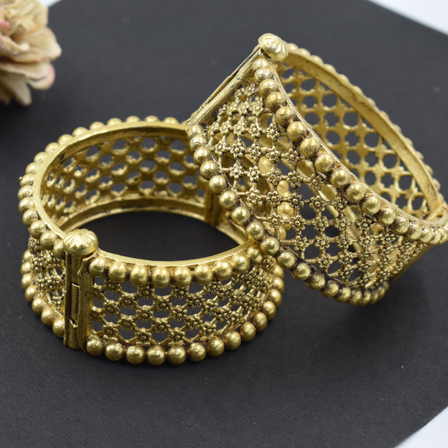 A pair of brass gold openable bangle