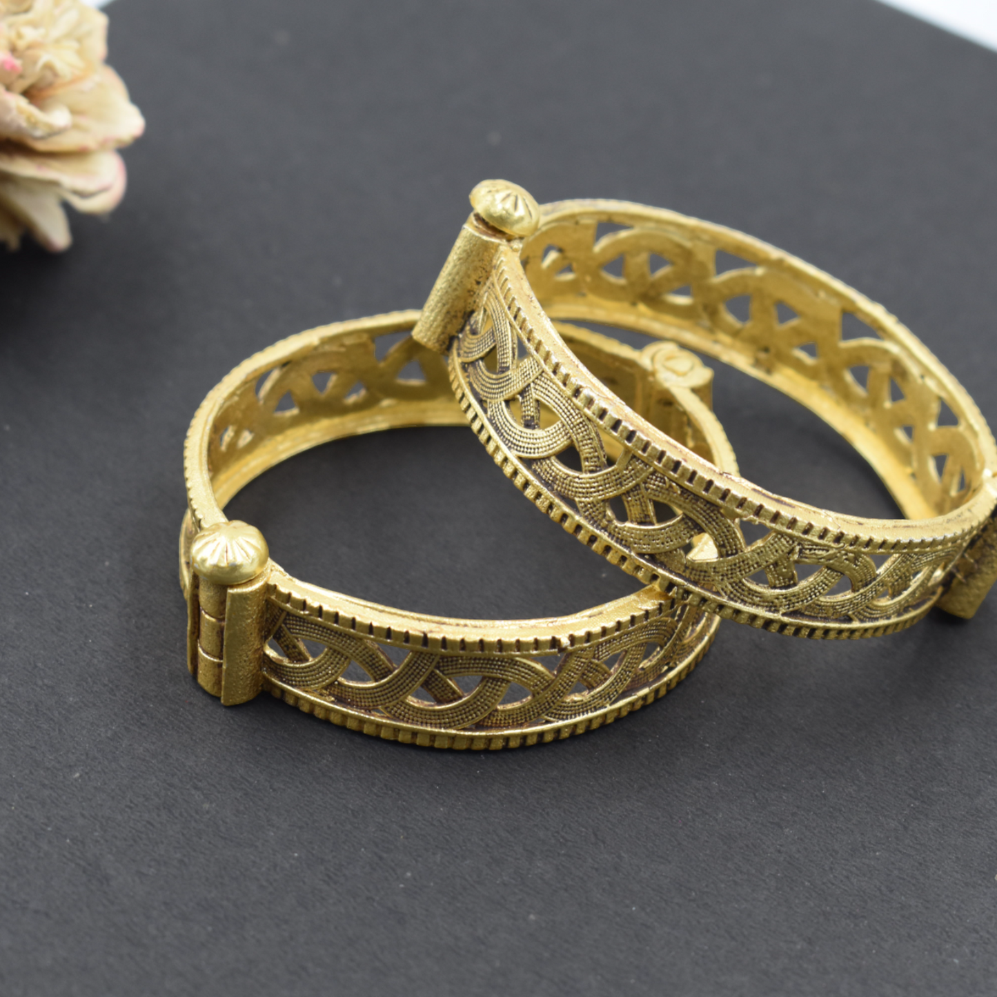 A pair of elegent brass gold openable bangle