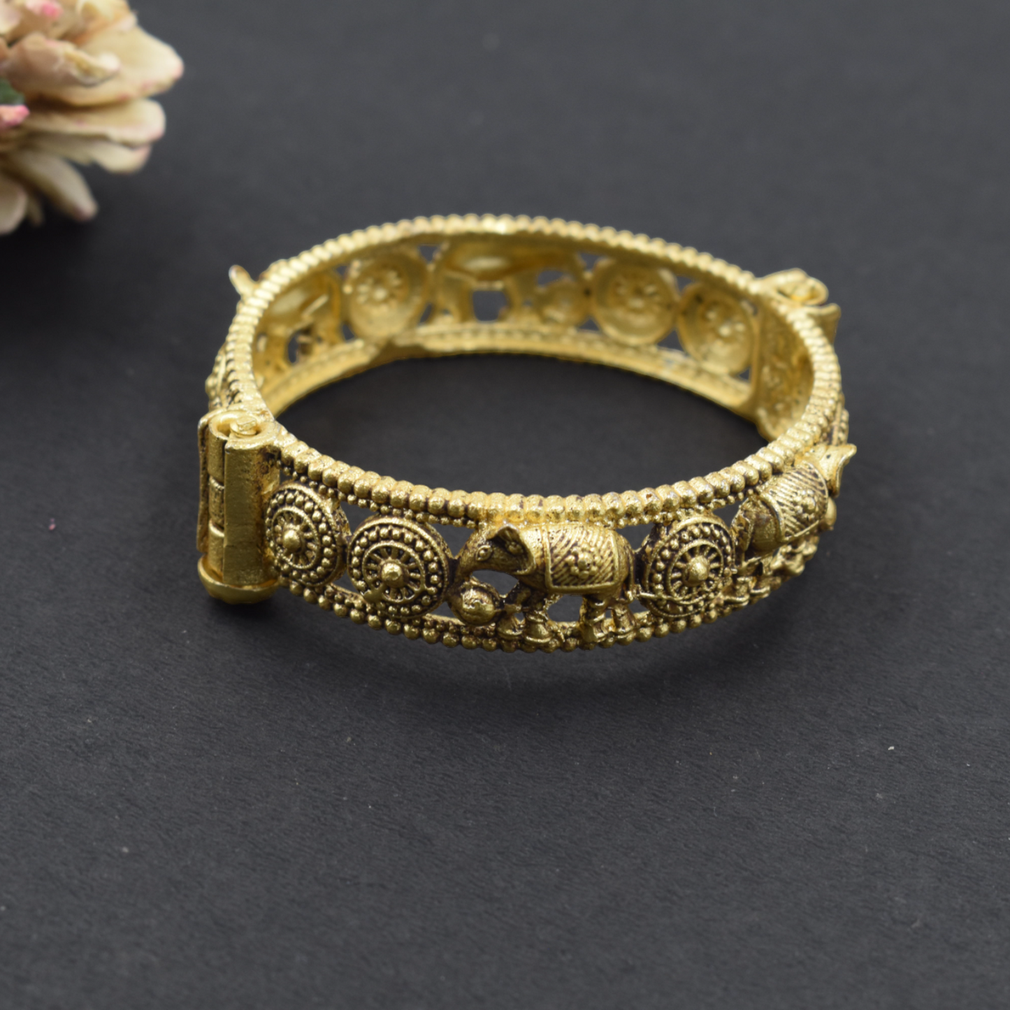 A pair of brass gold openable bangle