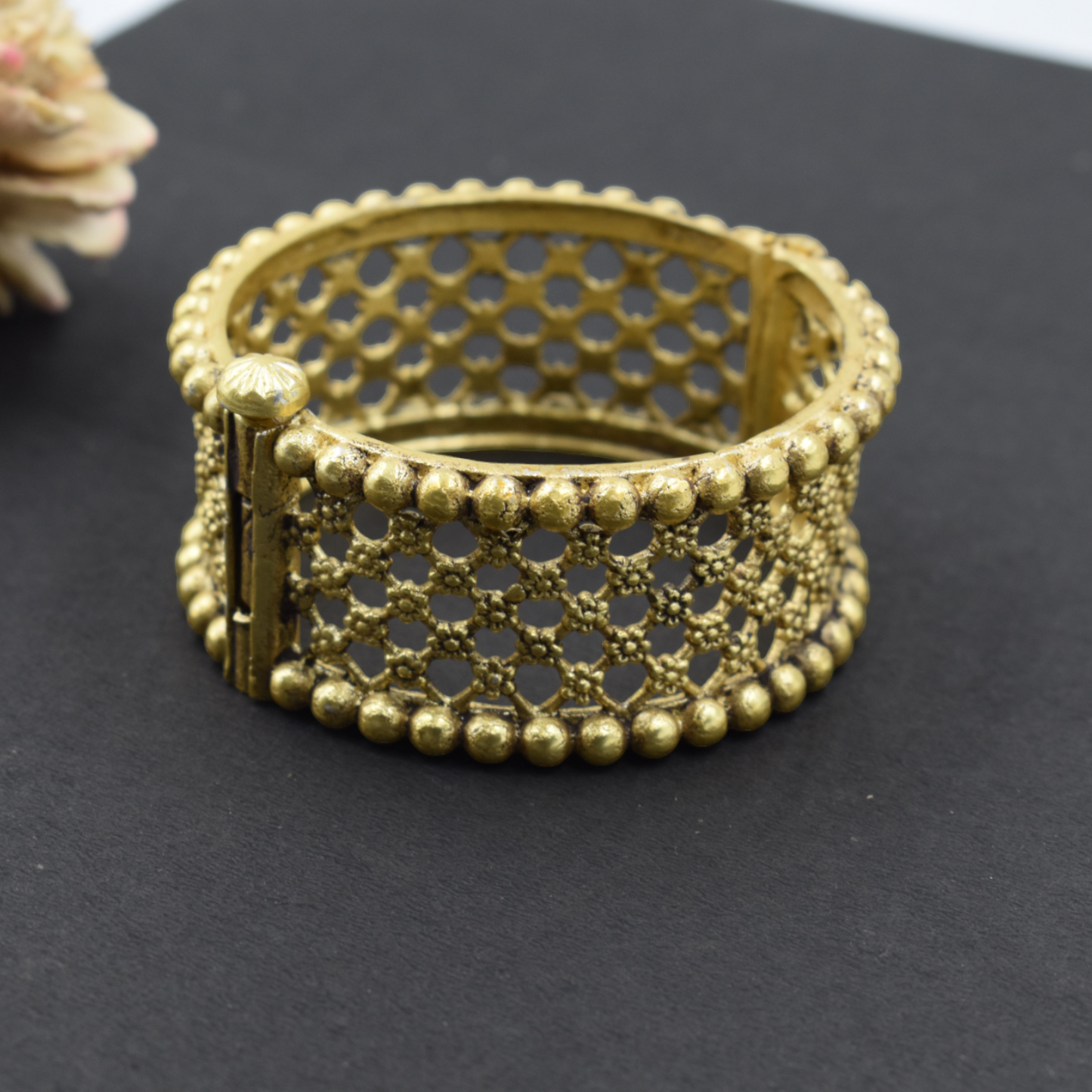 A pair of brass gold openable bangle