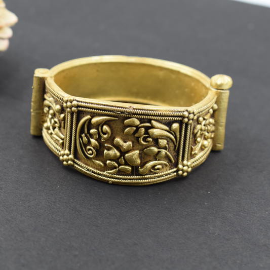 A pair of brass gold openable bangle